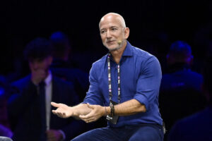 turin-italy-october-3-jeff-bezos-amazons-founder-speaks-with-john-elkann-stellantis-chairman-on-stag